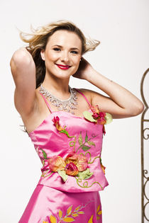 Blonde girl ina pink floral dress