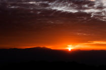Sunrise over the Himalayas. by Tom Hanslien
