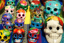 Grinning Mexican Skulls by John Mitchell