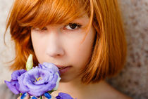 Beautiful redhead with chinese rose