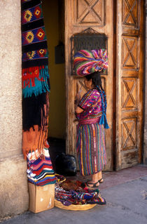 MAYAN TEXTILE VENDOR Antigua Guatemala by John Mitchell