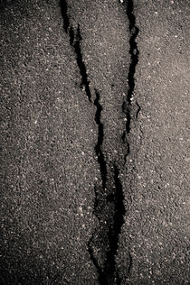Broken asphalt by Lars Hallstrom