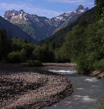Stream and mountain by Andras Neiser