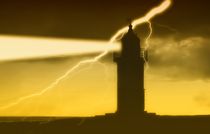 Lighthouse in Thunderstorm by Dan Kollmann