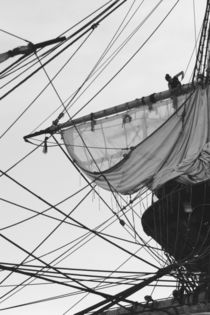 Sailor shortening sails on a tall ship - monochrome by Intensivelight Panorama-Edition