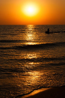 Beautiful seascape with orange warm sunrise by Serhii Zhukovskyi