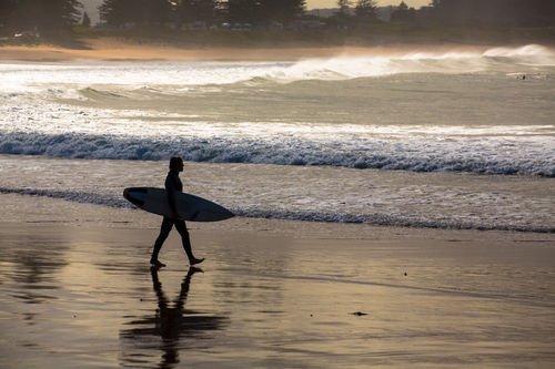 Surfer-at-palm-beach