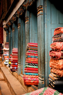 Textile shops in Bhaktapur, Nepal. by Tom Hanslien