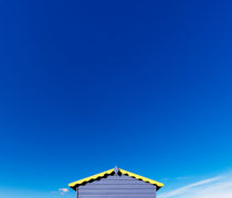 Yellow beach hut roof. by Tom Hanslien