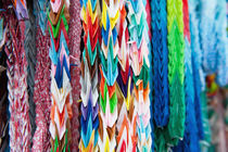 Close up of colorful origami offerings by holka