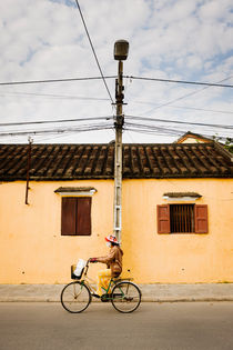 A passing cyclist, Hoi An. by Tom Hanslien