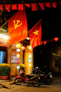 Communist flags in Hoi An. by Tom Hanslien