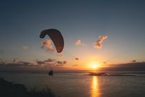Paragliding in the Sunset by Udo Behrends