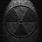 Radioactive-symbol-black-marble-texture-old