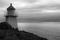 Lighthouse on the coast between Unstad and Eggum, black and white von travelfoto
