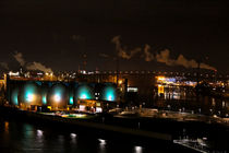 the sewage works of the city Hamburg in night by madle-fotowelt