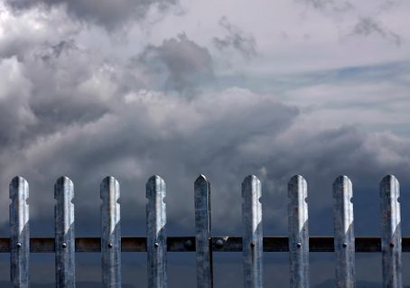 Fence-and-clouds
