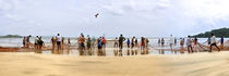 Goan People come together catching a hugh fishing net by creativemarc