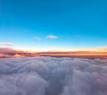 Velvet sunset above cloudscape from airplane by creativemarc