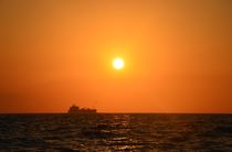 Cargo Ship At Sunset von Malcolm Snook