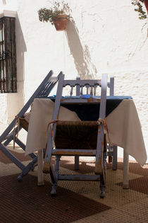 Staying hungry - table of a closed restaurant - Spain by Jörg Sobottka