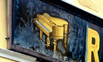 Golden piano by Leopold Brix