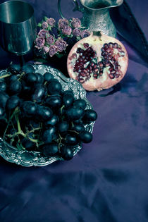 Still life with pomegranate and dark grapes by Jarek Blaminsky
