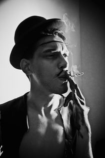 young man in a hat with a cigarette by Igor Korionov