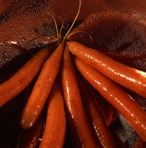 Fresh carrots in a colander by Intensivelight Panorama-Edition