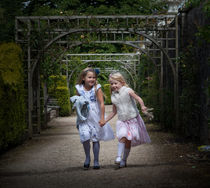 Young girls in a park von Leighton Collins