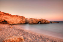 Beach with caves in Karpathos, Greece by Constantinos Iliopoulos