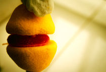 Yellow and red candy lemon-shaped by Gema Ibarra