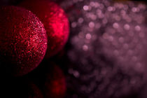 Christmas baubles decoration on defocused lights background  von Gema Ibarra