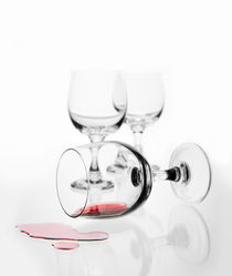 wine glass with red wine splashed by Arletta Cwalina