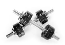 Crossed chrome hand barbells weights by Arletta Cwalina