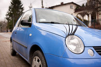 Blue funny car with eyelashes von Arletta Cwalina