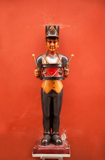 Carved drummer figure decoration by Arletta Cwalina