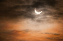 Partial solar eclipse in clouds von Arletta Cwalina