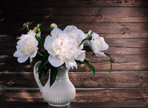 White peonies in a vase on a wooden background by larisa-koshkina