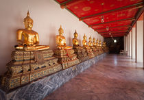 Golden Buddha Statues by Leighton Collins