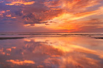 Sunset reflections on the beach, Texel island, The Netherlands by Sara Winter