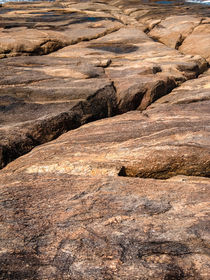 Rocks at the beach by Mauricio Santana