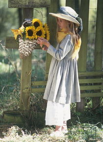 Romantic girl with sunflowers von arthousedesign