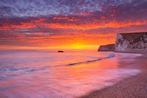 Cliffs at Durdle Door beach in Southern England at sunset by Sara Winter