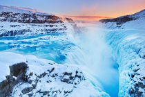 Frozen Gullfoss Falls in Iceland in winter at sunset by Sara Winter