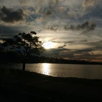 sunset and lake by Flavio Molina