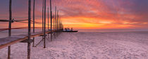 Seaside jetty at sunrise on Texel island, The Netherlands by Sara Winter