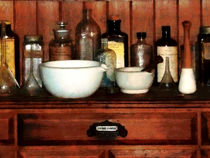 Cabinet With Mortar and Pestles by Susan Savad