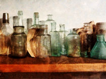 Row of Medicine Bottles  by Susan Savad