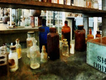 Assorted Chemicals in Bottles by Susan Savad